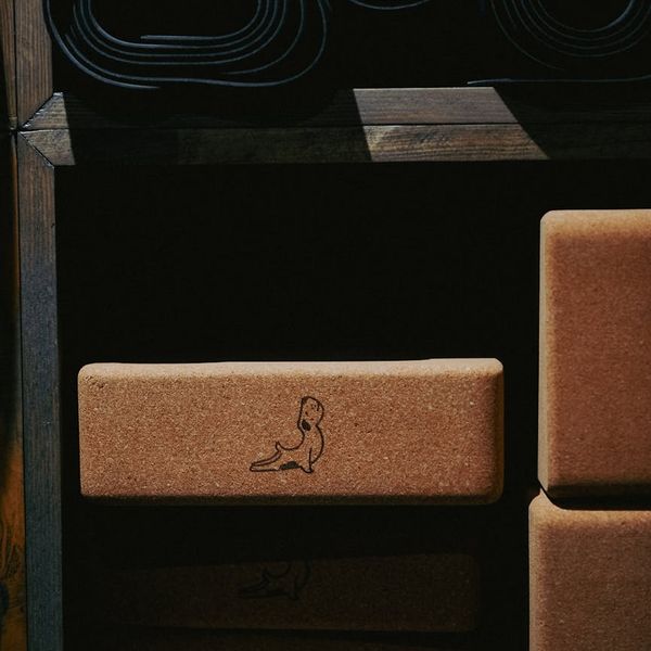 Zen yoga blocks and a rolled mat.